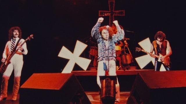 LONDON, UNITED KINGDOM - JANUARY 18: Geezer Butler, Ronnie James Dio, Vinny Appice (hidden, on drums) and Tony Iommi of Black Sabbath perform on stage during their 'Heaven and Hell' tour at Hammersmith Odeon, on January 18th, 1981 in London, England. (Photo by Pete Still/Redferns)