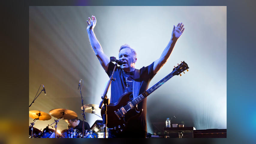 BERLIN, GERMANY - OCTOBER 07: Singer and guitarist Bernard Sumner of the British band New Order performs live on stage during a concert at the Tempodrom on October 7, 2019 in Berlin, Germany. (Photo by Frank Hoensch/Redferns)