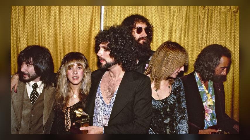 LOS ANGELES - FEBRUARY 23: Rock group Fleetwood Mac wins the Album of the year award at the 20th Grammy awards at the Shrine Auditorium. Left to right producer Richard Dashut, Stevie Nicks, Lindsey Buckingham, Mick Fleetwood, Christine McVie and John McVie on February 23, 1978 in Los Angeles, california. (Photo by Michael Ochs Archives/Getty Images)