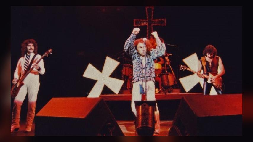 LONDON, UNITED KINGDOM - JANUARY 18: Geezer Butler, Ronnie James Dio, Vinny Appice (hidden, on drums) and Tony Iommi of Black Sabbath perform on stage during their 'Heaven and Hell' tour at Hammersmith Odeon, on January 18th, 1981 in London, England. (Photo by Pete Still/Redferns)