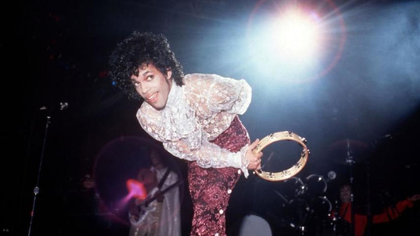 Prince performs onstage during the 1984 Purple Rain Tour on November 4, 1984, at the Joe Louis Arena in Detroit, Michigan. (Photo by Ross Marino/Getty Images)